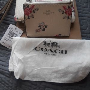 White floral coach id wallet